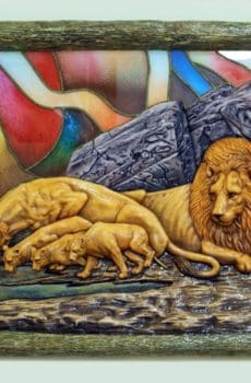 3d wall sculpture of lioness with frame