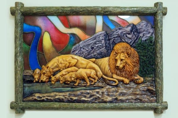 3d wall sculpture of lioness with frame