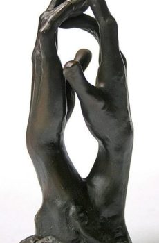 Black human hand sculpture from abstract art