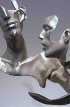 Human sculpture from silver metal abstract art