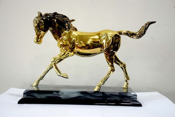 Arabic gold plated horse sculpture with crystal base