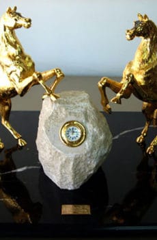 Gold plated horse sculptures with clock made in Dubai