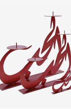 Red Arabic calligraphy letter candle holder
