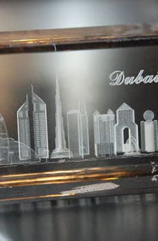 Customized crystal cube with laser engraving of Dubai skyline