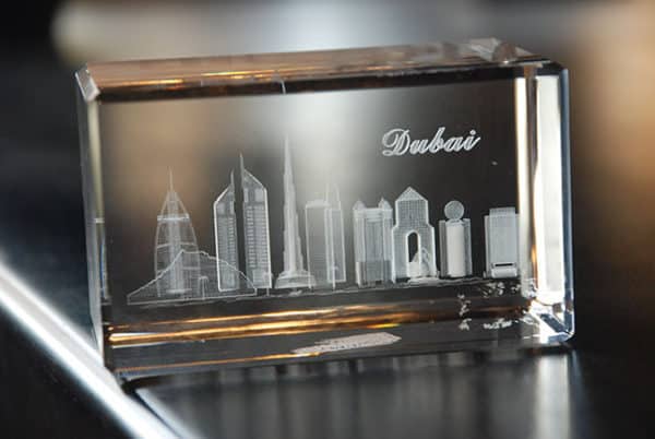 Customized crystal cube with laser engraving of Dubai skyline