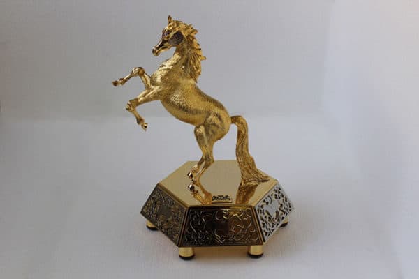 Gold plated horse on two legs sculpture