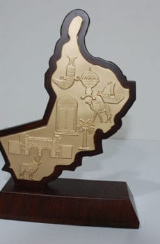 Wood and metal souvenir map of Oman
