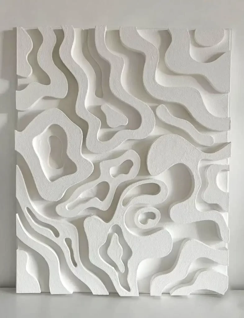 Contemporary 3D wall installation with organic swirl patterns, adding a bespoke artistic touch to interiors in Abu Dhabi.